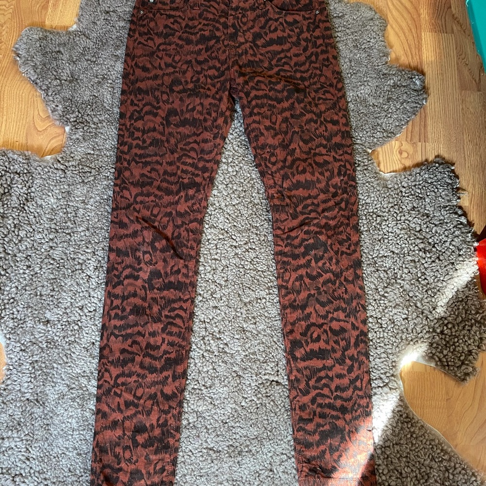 AG leopard print fine wale corduroy jeans.